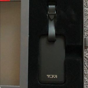 tumi luggage tag power bank